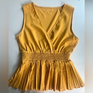 Women’s Sleeveless Pleated Peplum Top